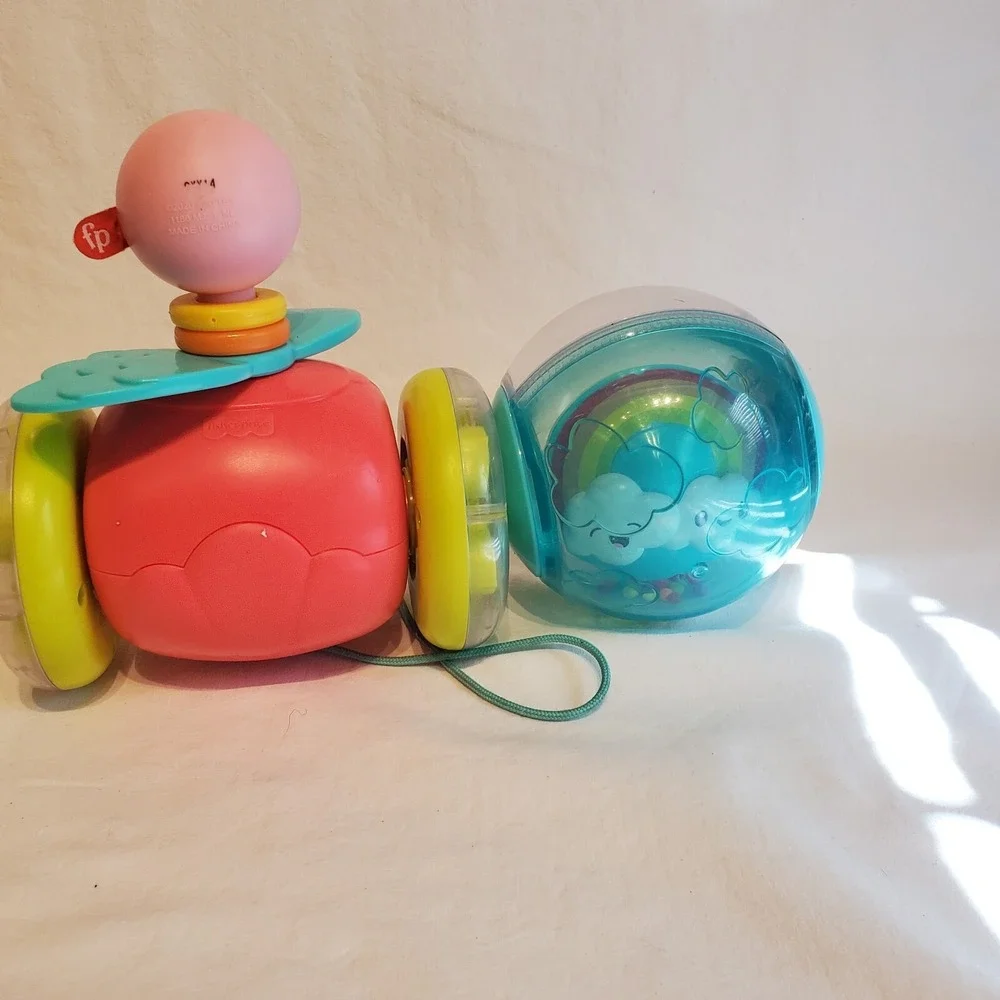 Fisher Price Paradise Pals Flamingo Roll A Round Rainbow Smile Face Pull Toys